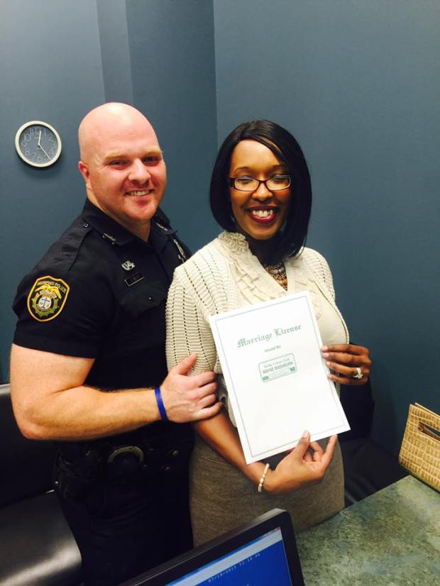 Latrivia Nelson and Bruce Welch get their marriage license. 